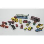 A quantity of Dinky, Corgi and other play worn lorries and other vehicles,