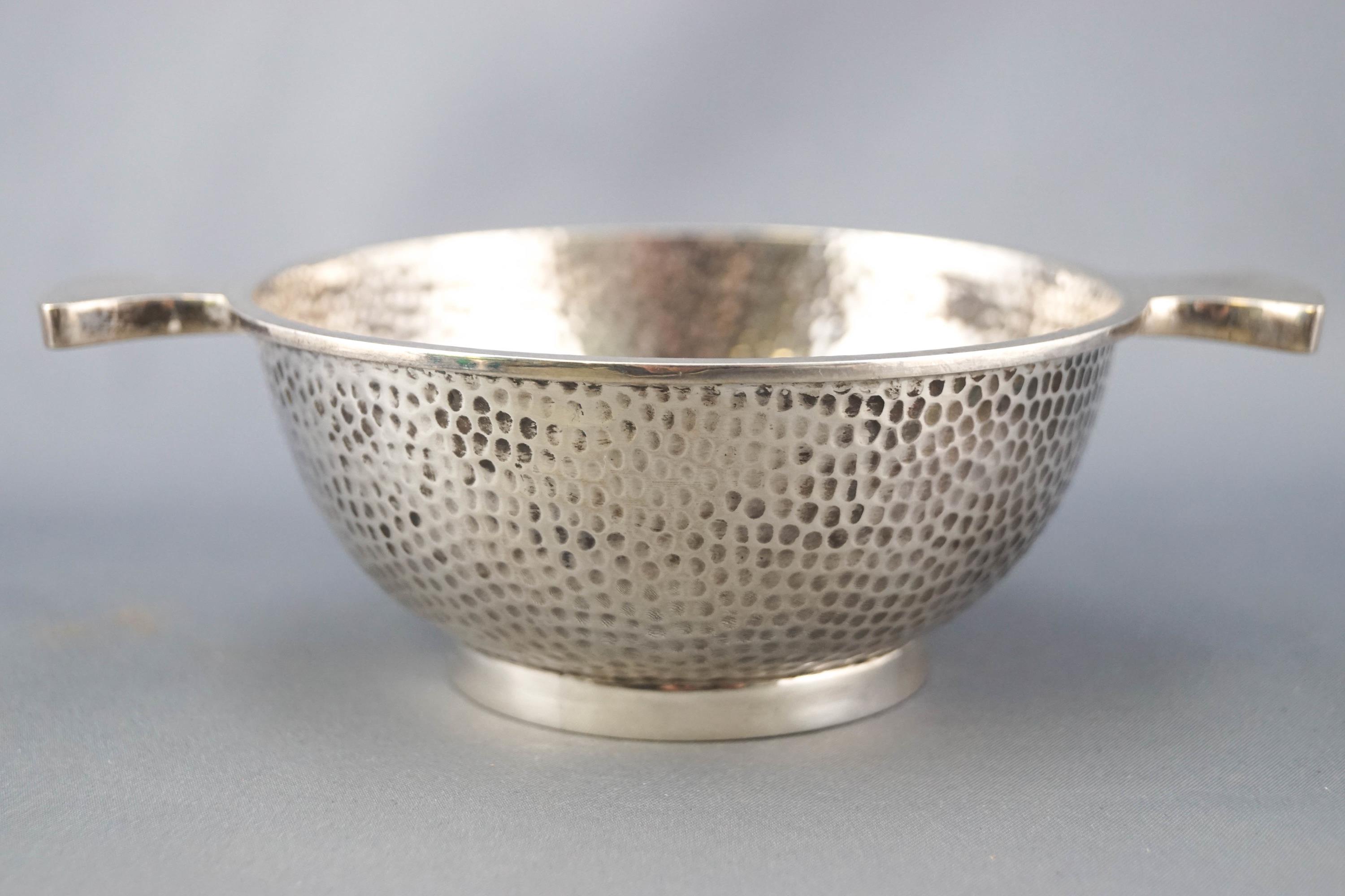 A silver spot hammered finish quaich, of traditional form, Birmingham 1923, 4.