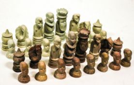 A set of African soapstone chess pieces, the knights modelled as elephants, the King 10.