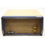 A Dansette Troubadour table top record player with cream and blue case enclosing the turn table and