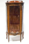 A Louis XVI style mahogany display cabinet with gilt metal mounts,