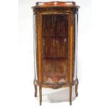A Louis XVI style mahogany display cabinet with gilt metal mounts,