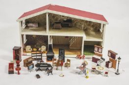 A Lundy dolls house in box with lights and furniture