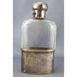 A silver and glass hip flask,