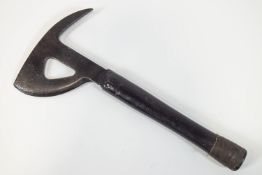 A forged metal WWII cockpit escape tool for pilots to use in an emergency,