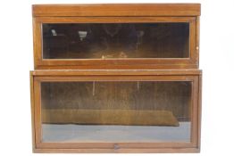 A mahogany two tier Globe Wernicke style bookcase, with lift up glazed doors,