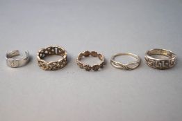 A collection of ten silver dress rings of variable designs. Ranging in size from G to Q.