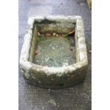 A carved stone trough,