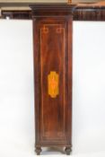 A 19th century mahogany and marquetry tall cupboard,