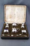 A Mappin & Webb boxed six piece plated cruet set, consisting of two open salts,