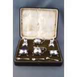 A Mappin & Webb boxed six piece plated cruet set, consisting of two open salts,