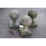 Three reconstituted stone ball finials,
