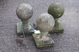 Three reconstituted stone ball finials,