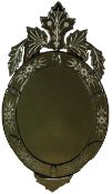 A pair of 20th century Venetian style wall mirrors with leaf form pediments,