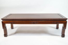 A Chinese hardwood coffee table,