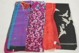 Four silk scarves by Armani, YSL,