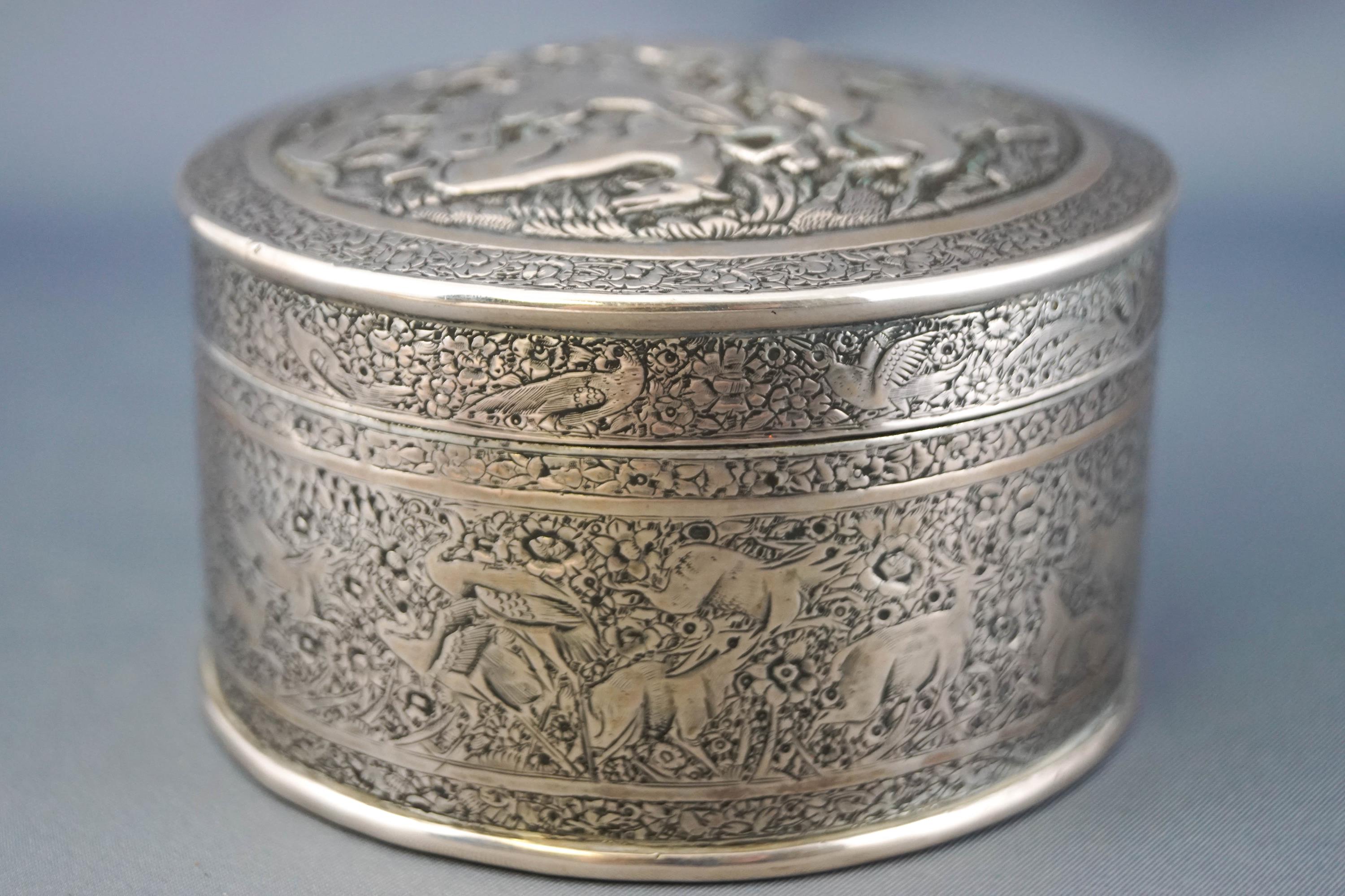 A possibly Indian, white metal round form box with domed pull off cover,