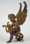 A gilt bronze figure of a Putti,