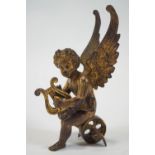 A gilt bronze figure of a Putti,