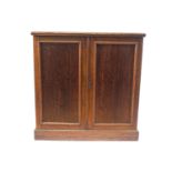 A Victorian mahogany two door cupboard,