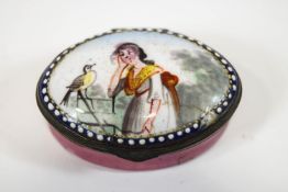 A late 18th century Bilston enamel oval enamel patch box polychrome decorated to the hinged cover