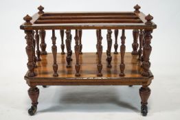 A Victorian walnut and marquetry Canterbury with turned uprights,