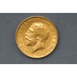 A George V half sovereign coin, dated 1912. 4.
