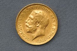 A George V half sovereign coin, dated 1912. 4.