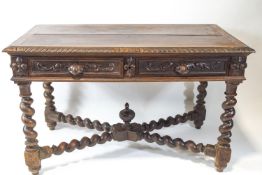 An oak Tudor style two drawer writing/side table,