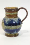 A Doulton Lambeth stoneware Victoria diamond jubilee jug, with a scroll handle and two bands,