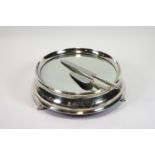 A round form wedding cake stand in silver plate,