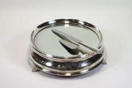 A round form wedding cake stand in silver plate,