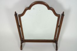 A mahogany swing dressing table mirror,