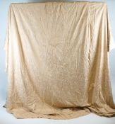 A set of four salmon pink curtains, lined and inter-lined,