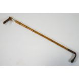 A horn handled bamboo riding crop with silver collar, Birmingham 1886,