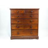 A Victorian mahogany chest of drawers, with two narrow drawers above four wide graduated drawers,