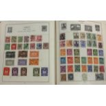 A Strand Stamp Album, containing World stamps,