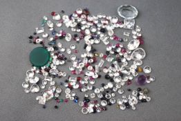 A large collection of loose gemstones to include colourless cubic zirconia, quartz,