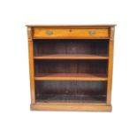 A mahogany standing bookcase, with one frieze drawer flanked by gilt metal mounts,