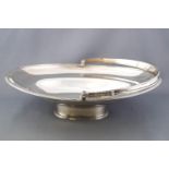 An oval silver swing handled cake basket, of plain form,