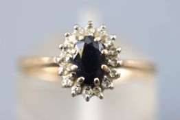 A yellow and white metal cluster ring.