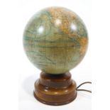 A mid 20th century glass and mahogany globe lamp,