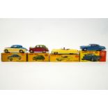 A group of four boxed Dinky toys, to include a 156 Rover saloon, 152 Austin Devon saloon,
