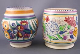 A Poole pottery vase painted with flowers and leaves, impressed marks,