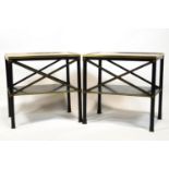 A pair of black japanned occasional tables, each of two tier form,