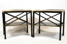 A pair of black japanned occasional tables, each of two tier form,