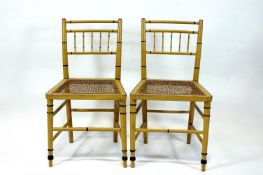 A group of four Bergere faux bamboo dining chairs,