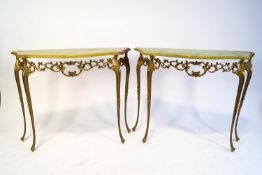 A pair of onyx topped console tables,