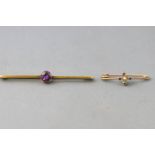 A collection of two bar brooches to include: A stamped 15ct bar brooch with a central amethyst;