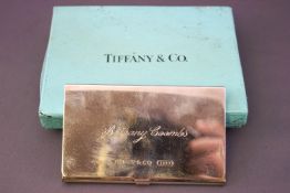 A Tiffany & Co plain rectangular form silver card case with flip top lid, 6cm x 9 cm,